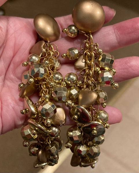 Cascading gold plastic Star earrings clip