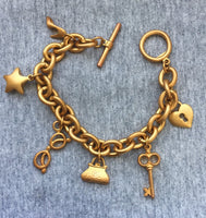 Vtg VS Victoria's secret charm bracelets satin gold tone star key purse shoe Designer